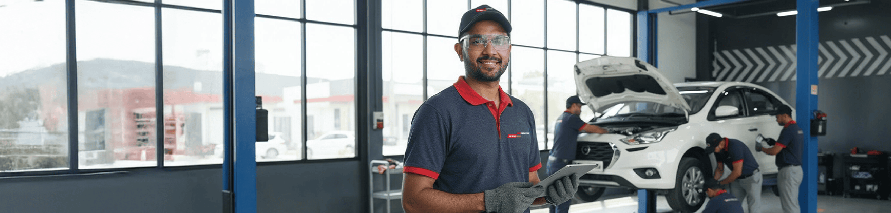 Petromin Express man on the background at the service center.